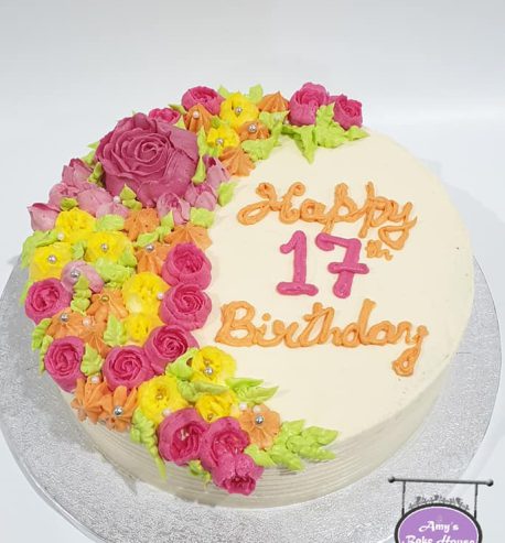 attachment-https://www.amysbakehouse.com.au/wp-content/uploads/2021/11/Chocolate-cake-covered-in-buttercream-florals-2-458x493.jpg
