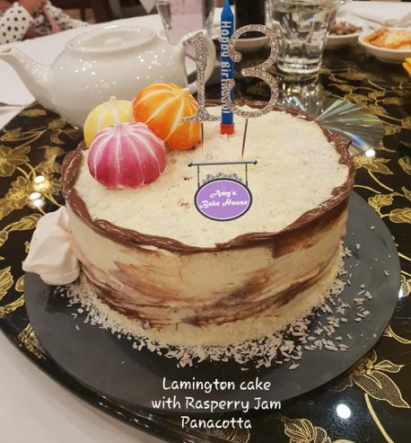 attachment-https://www.amysbakehouse.com.au/wp-content/uploads/2021/11/Lamington-Rasperry-Jam-Panacotta-Cake-1-458x493.jpg