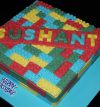 attachment-https://www.amysbakehouse.com.au/wp-content/uploads/2021/11/Lego_Themed_Green_Velvet_Birthday_Cake2-scaled-1-100x107.jpg