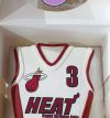 attachment-https://www.amysbakehouse.com.au/wp-content/uploads/2021/11/Miami-Heat-Jersey-Cake-1-100x107.jpg