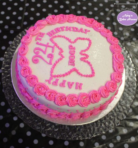 attachment-https://www.amysbakehouse.com.au/wp-content/uploads/2021/11/Rosette-Pink-Velvet-Birthday-Cake3-scaled-1-458x493.jpg