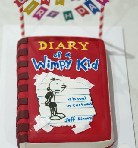 attachment-https://www.amysbakehouse.com.au/wp-content/uploads/2021/11/The-Diary-of-a-Wimpy-Kid-cake-3-458x493.jpg