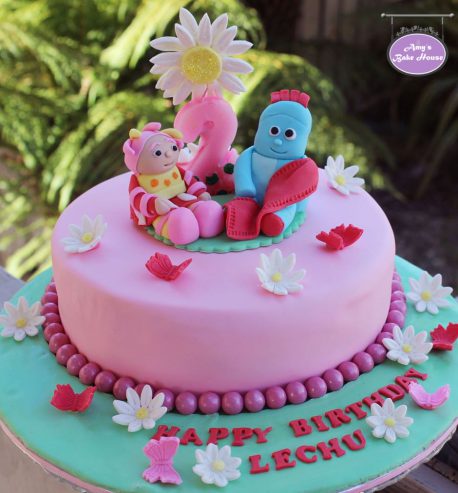 attachment-https://www.amysbakehouse.com.au/wp-content/uploads/2021/11/iggle-piggle-upsy-daisy-in-the-night-garden-birthday-cake-1-458x493.jpg