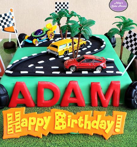 attachment-https://www.amysbakehouse.com.au/wp-content/uploads/2021/11/race-track-themed-cake-2-458x493.jpg