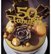 attachment-https://www.amysbakehouse.com.au/wp-content/uploads/2022/02/Black-Gold-Chocolate-Themed-Cake1-100x107.jpg